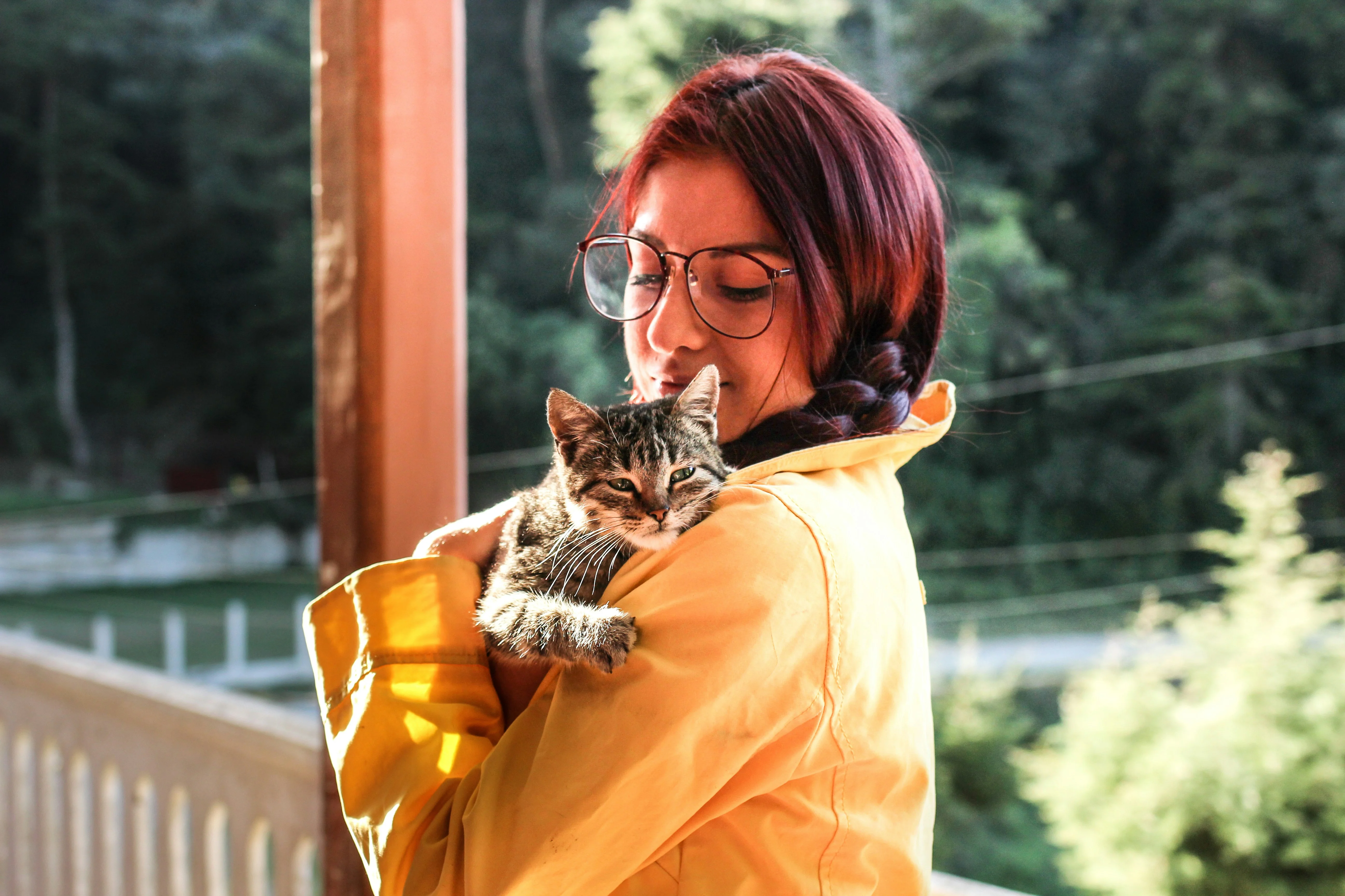 Photo representing Sarah Martinez, holding her cat